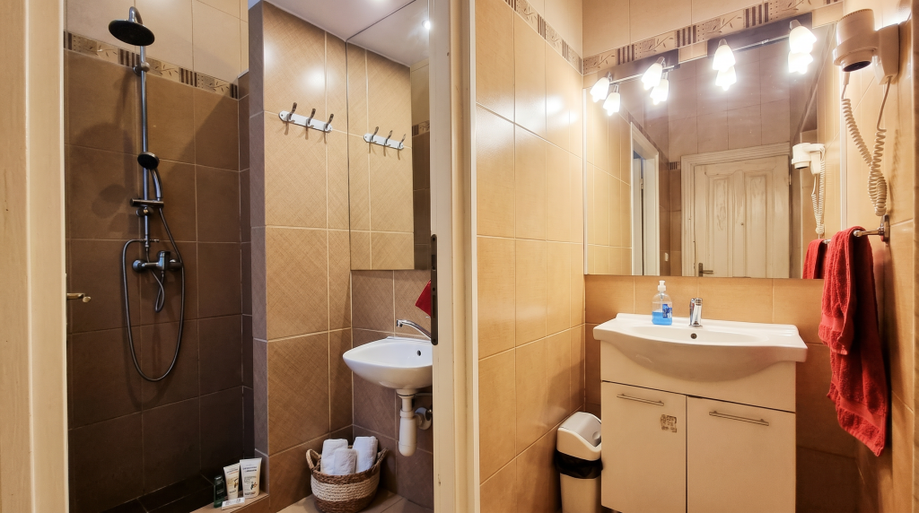 Shared bathroom facilities inside The Easy Access Apartment